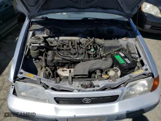 1995 Toyota Tercel DX with VIN JT2EL56E7S7011335, listed as a Copart auction lot 67978774 with 182,025 mi miles and Salvage Title. Bid and sale history available at carsss.com. Image 11.