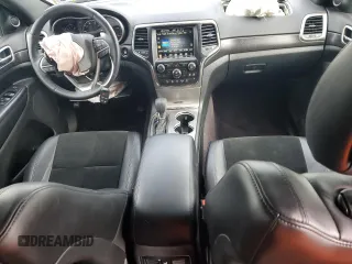 2017 Jeep Grand Cherokee Altitude z VIN 1C4RJFAG9HC720250, wystawiony jako Copart lot #56956155 z przebiegiem 138 879 mil mil oraz Szkoda całkowita • Salvage title. Historia ofert i sprzedaży dostępna na DreamBid. Obrazek 8.