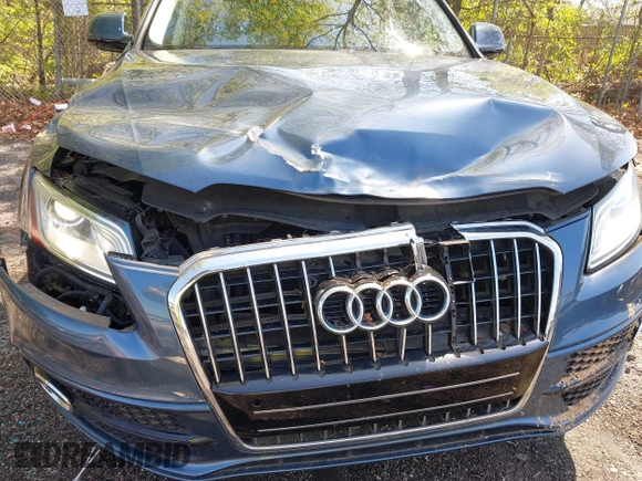 2015 Audi Q5 Premium Plus z VIN WA1DGAFP8FA088753, wystawiony jako IAAI lot #41983265 z przebiegiem 55 077 mil mil oraz . Historia ofert i sprzedaży dostępna na DreamBid. Obrazek 18.