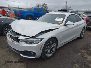 2016 BMW 4 Series 428i with VIN WBA3N7C54GK227475, listed as a IAAI auction lot 40963425 with 87,408 mi miles and . Bid and sale history available at carsss.com. Image 2.
