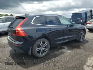 2018 Volvo XC60 Momentum with VIN LYV102RK6JB105943, listed as a Copart auction lot 60496055 with 72,706 mi miles and Salvage title. Bid and sale history available at DreamBid. Image 3.