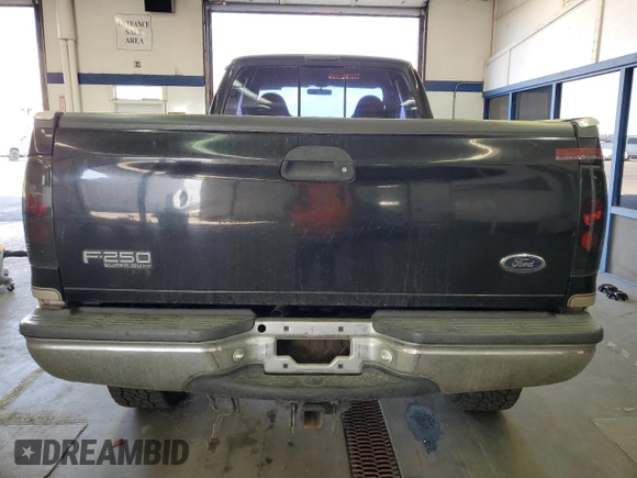 1999 Ford F-250 XL with VIN 1FTNX21F0XEC99244, listed as a Copart auction lot 72545104 with 264,697 mi miles and Salvage Title. Bid and sale history available at DreamBid. Image 6.