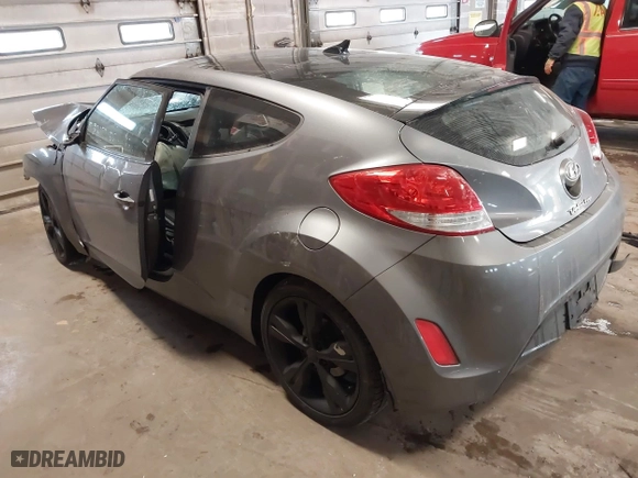 2016 Hyundai Veloster with VIN KMHTC6AD8GU267426, listed as a IAAI auction lot 41349385 with 114,245 mi miles. Bid and sale history available at carsss.com. Image 3.