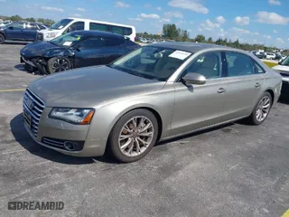 2012 Audi A8 L with VIN WAURVAFD0CN001646, listed as a IAAI auction lot 41524110 with 105,187 mi miles. Bid and sale history available at carsss.com. Image 2.