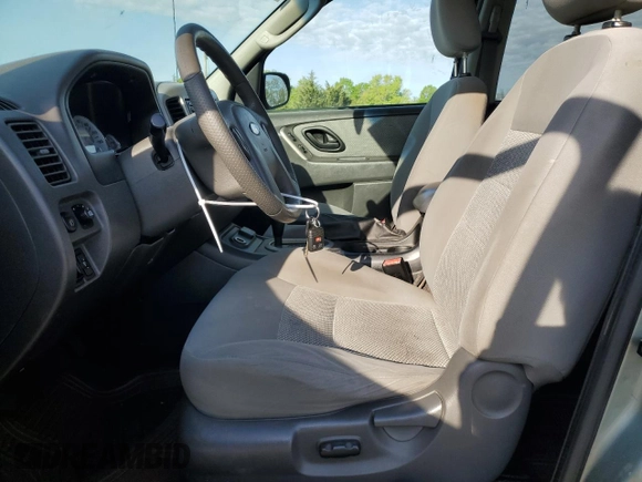 2005 Ford Escape Hybrid with VIN 1FMCU96HX5KC45835, listed as a Copart auction lot 55238065 with 223,769 mi miles and Salvage title. Bid and sale history available at DreamBid. Image 7.