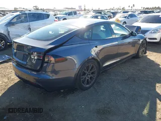 2023 Tesla Model S with VIN 5YJSA1E5XPF500341, listed as a IAAI auction lot 40756406 with 11,583 mi miles and . Bid and sale history available at DreamBid. Image 4.