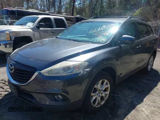2015 Mazda CX-9 Touring with VIN JM3TB3CV1F0461854, listed as a IAAI auction lot 42068299 with 128,124 mi miles. Bid and sale history available at carsss.com. Image 17.