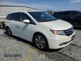 2014 Honda Odyssey Touring with VIN 5FNRL5H9XEB036821, listed as a Copart auction lot 49167125 with 169,472 mi miles and Salvage Title. Bid and sale history available at carsss.com. Image 4.