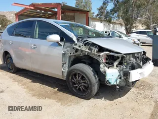 2017 Toyota Prius v Two with VIN JTDZN3EU3HJ063704, listed as a IAAI auction lot 42076703 with 131,668 mi miles. Bid and sale history available at carsss.com. Image 1.
