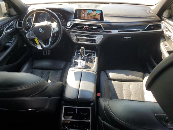 2019 BMW 7 Series 750i with VIN WBA7F0C5XKGM25771, listed as a Copart auction lot 47239195 with 73,691 mi miles and Salvage Title. Bid and sale history available at carsss.com. Image 8.