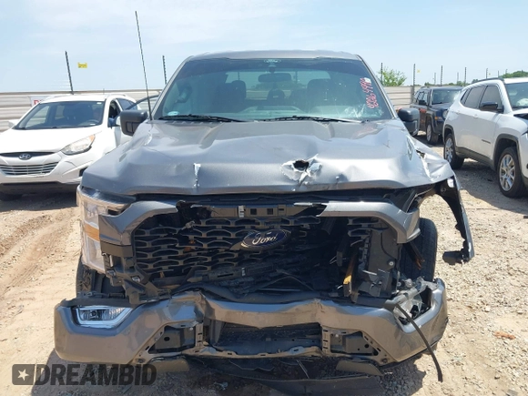 2021 Ford F-150 XL with VIN 1FTEW1CP2MKF04739, listed as a IAAI auction lot 42264990 with 87,711 mi miles and . Bid and sale history available at DreamBid. Image 12.