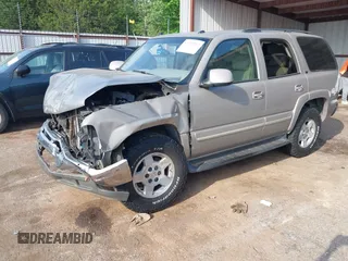 2004 Chevrolet Tahoe LT with VIN 1GNEC13Z34R294550, listed as a IAAI auction lot 42330212 with 298,283 mi miles and . Bid and sale history available at DreamBid. Image 2.