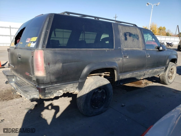 1997 GMC Suburban with VIN 3GKFK16R3VG511306, listed as a Copart auction lot 78504814 with NaN miles and Salvage Title. Bid and sale history available at carsss.com. Image 3.