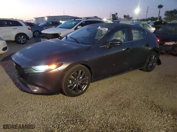 2019 Mazda Mazda3 Hatchback with VIN JM1BPBJM4K1125131, listed as a Copart auction lot 82978154 with 35,555 mi miles and Salvage Title. Bid and sale history available at carsss.com. Image 1.