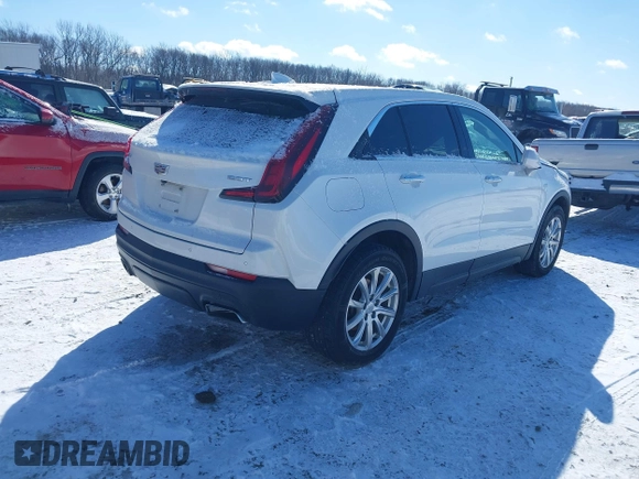 2019 Cadillac XT4 FWD Luxury z VIN 1GYAZAR4XKF170642, wystawiony jako IAAI lot #41585684 z przebiegiem 74 512 mil mil oraz . Historia ofert i sprzedaży dostępna na DreamBid. Obrazek 4.