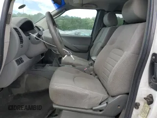 2006 Nissan Frontier XE with VIN 1N6BD06T56C432179, listed as a Copart auction lot 60276515 with 156,567 mi miles and Salvage title. Bid and sale history available at DreamBid. Image 7.