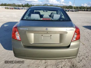 2006 Suzuki Forenza z VIN KL5JD56Z26K261080, wystawiony jako Copart lot #87112194 z przebiegiem 191 049 mil mil oraz Szkody całkowita. Historia ofert i sprzedaży dostępna na DreamBid. Obrazek 6.