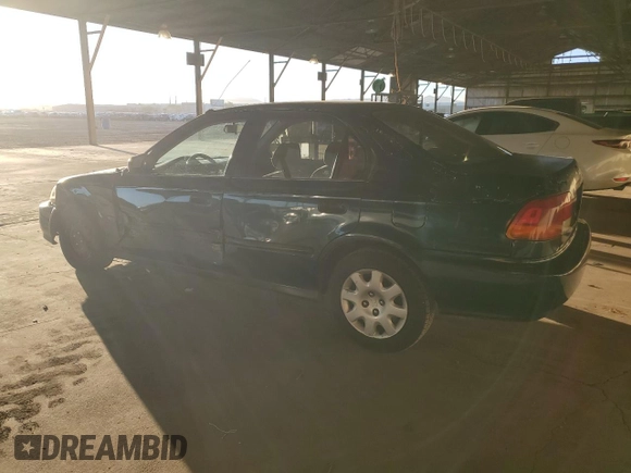 1997 Honda Civic DX with VIN JHMEJ6623VS028089, listed as a Copart auction lot 78659644 with 194,593 mi miles and Salvage Title. Bid and sale history available at DreamBid. Image 2.