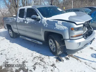 2016 Chevrolet Silverado 1500 LT with VIN 1GCVKREC8GZ228308, listed as a IAAI auction lot 41625569 with 100,669 mi miles. Bid and sale history available at carsss.com. Image 1.
