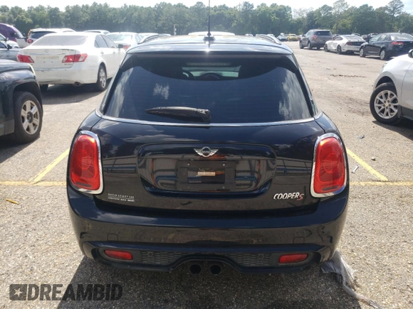 2016 MINI Hardtop 4 Door S with VIN WMWXU3C58G2B67264, listed as a Copart auction lot 61454215 with 66,550 mi miles and Salvage title. Bid and sale history available at DreamBid. Image 6.