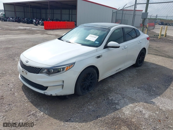 2016 Kia Optima EX with VIN 5XXGU4L38GG013197, listed as a IAAI auction lot 42125301 with 110,128 mi miles. Bid and sale history available at carsss.com. Image 2.