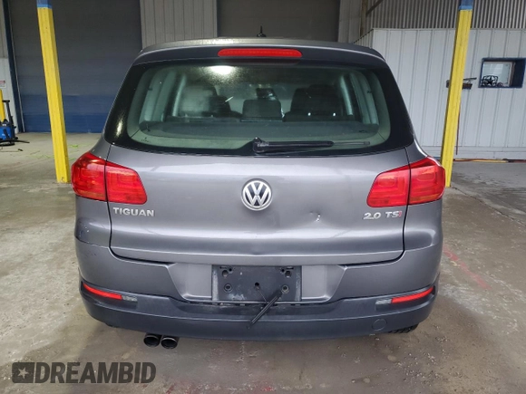 2014 Volkswagen Tiguan SE z VIN WVGAV3AX6EW542464, wystawiony jako Copart lot #84672184 z przebiegiem 144 064 mil mil oraz Czysty tytuł • Clean title. Historia ofert i sprzedaży dostępna na DreamBid. Obrazek 6.