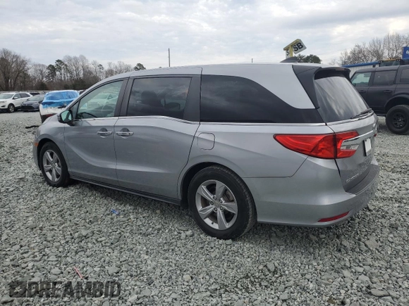 2019 Honda Odyssey EX-L with VIN 5FNRL6H72KB036411, listed as a Copart auction lot 43277355 with 76,244 mi miles and Salvage Title. Bid and sale history available at DreamBid. Image 2.