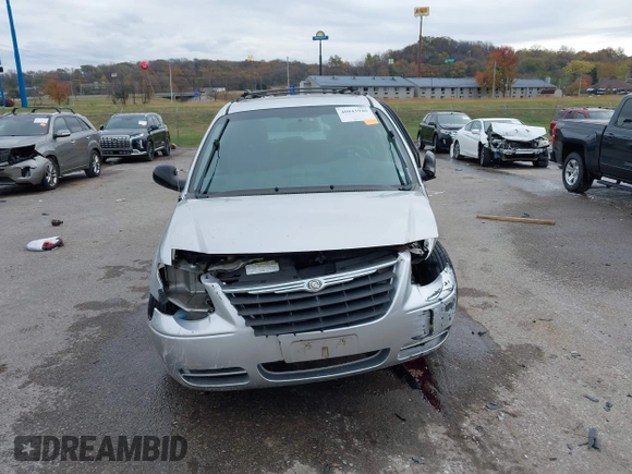 2005 Chrysler Town & Country LX with VIN 2C4GP44R95R307156, listed as a IAAI auction lot 40843940 with Not Provided miles and . Bid and sale history available at DreamBid. Image 12.