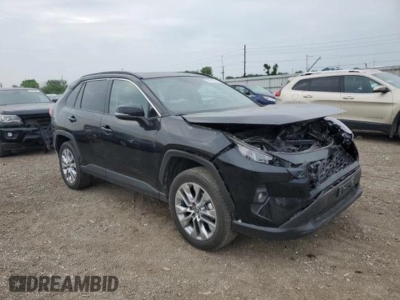 2024 Toyota RAV4 XLE Premium with VIN 2T3A1RFV3RC428731, listed as a Copart auction lot 59918945 with 26,263 mi miles and Salvage title. Bid and sale history available at DreamBid. Image 4.