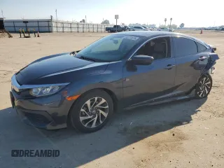2017 Honda Civic EX z VIN 2HGFC2F77HH555408, wystawiony jako Copart lot #50771675 z przebiegiem 75 424 mil mil oraz Szkody całkowita. Historia ofert i sprzedaży dostępna na DreamBid. Obrazek 1.