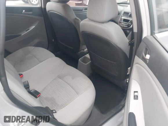 2015 Hyundai Accent GLS with VIN KMHCT4AE7FU930948, listed as a IAAI auction lot 42171213 with 150,543 mi miles and . Bid and sale history available at carsss.com. Image 8.