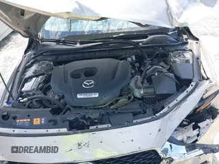 2022 Mazda 3 2.5 Turbo with VIN 3MZBPBAY8NM300598, listed as a IAAI auction lot 42569553 with 27,736 mi miles and . Bid and sale history available at DreamBid. Image 10.