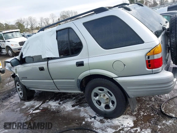 2001 Honda Passport LX z VIN 4S6CK58W014401073, wystawiony jako IAAI lot #41380551 z przebiegiem 259 878 mil mil oraz . Historia ofert i sprzedaży dostępna na DreamBid. Obrazek 14.