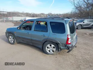 2003 Mazda Tribute ES with VIN 4F2CZ96133KM29066, listed as a IAAI auction lot 41581210 with 265,586 mi miles. Bid and sale history available at carsss.com. Image 3.
