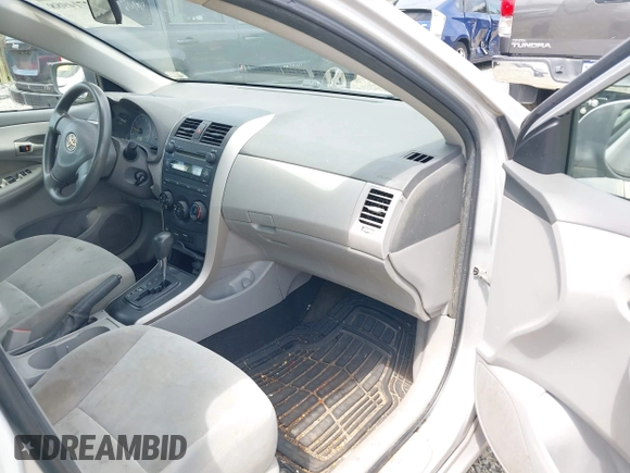2009 Toyota Corolla with VIN 1NXBU40E89Z128911, listed as a IAAI auction lot 42714988 with 215,416 mi miles and . Bid and sale history available at DreamBid. Image 5.