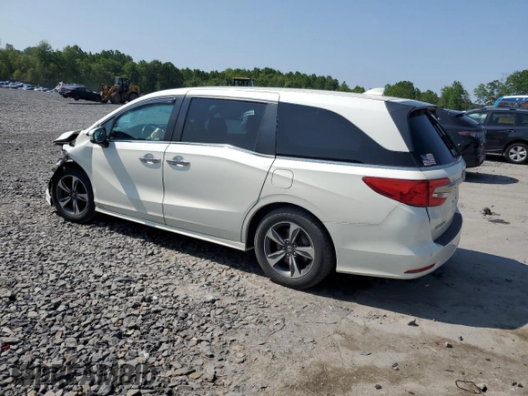 2019 Honda Odyssey Touring with VIN 5FNRL6H81KB051846, listed as a Copart auction lot 58723015 with 68,142 mi miles and Salvage title. Bid and sale history available at DreamBid. Image 2.