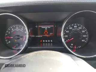 2016 Ford Mustang V6 z VIN 1FATP8EMXG5243434, wystawiony jako IAAI lot #41484039 z przebiegiem 131 032 mil mil oraz . Historia ofert i sprzedaży dostępna na DreamBid. Obrazek 7.