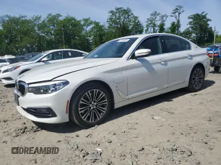 2018 BMW 5 Series 530e xDrive with VIN WBAJB1C51JG624259, listed as a Copart auction lot 57161285 with 133,463 mi miles and Clean title. Bid and sale history available at DreamBid. Image 1.