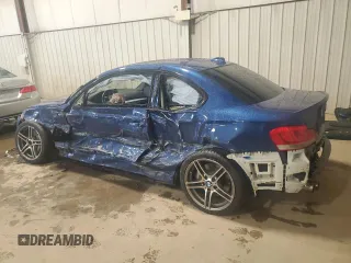 2013 BMW 1 Series 135i with VIN WBAUC9C51DVY60421, listed as a Copart auction lot 52700235 with 90,837 mi miles and Salvage Title. Bid and sale history available at carsss.com. Image 2.