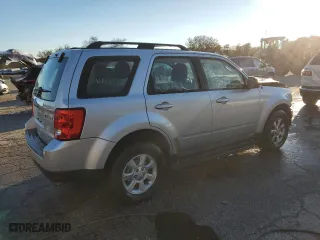 2010 Mazda Tribute Grand Touring with VIN 4F2CY0C74AKM03659, listed as a Copart auction lot 84494254 with 160,177 mi miles and Salvage Title. Bid and sale history available at carsss.com. Image 3.