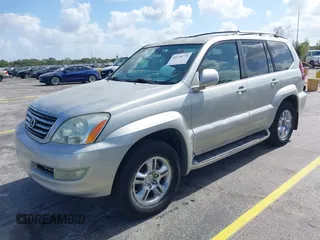 2003 Lexus GX with VIN JTJBT20X530002434, listed as a IAAI auction lot 42176772 with 140,226 mi miles. Bid and sale history available at carsss.com. Image 2.
