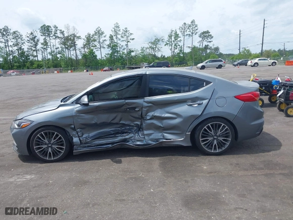 2018 Hyundai Elantra Sport with VIN KMHD04LB0JU597002, listed as a IAAI auction lot 41983087 with 95,583 mi miles. Bid and sale history available at carsss.com. Image 14.