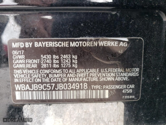 2018 BMW 5 Series M550i xDrive with VIN WBAJB9C57JB034918, listed as a Copart auction lot 51668675 with 94,492 mi miles and Clean Title. Bid and sale history available at carsss.com. Image 12.