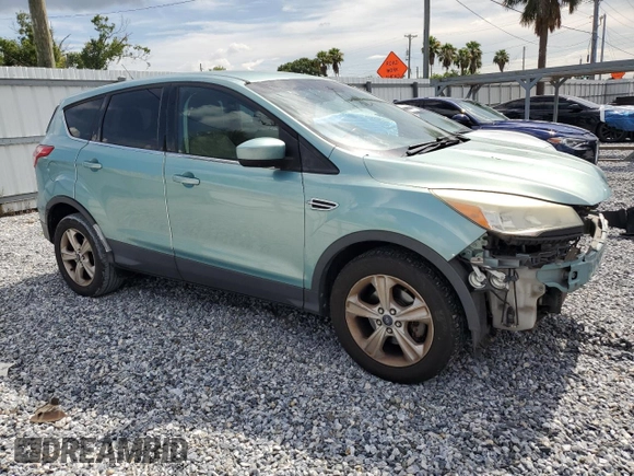 2013 Ford Escape SE with VIN 1FMCU0GX7DUC41956, listed as a Copart auction lot 61627235 with 117,600 mi miles and Salvage title. Bid and sale history available at DreamBid. Image 4.