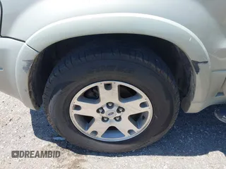 2004 Ford Escape Limited with VIN 1FMCU04174KA97935, listed as a IAAI auction lot 42314791 with 143,900 mi miles and . Bid and sale history available at DreamBid. Image 6.
