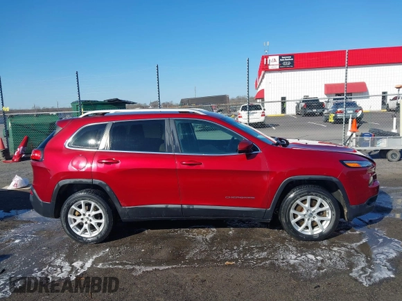 2015 Jeep Cherokee Latitude with VIN 1C4PJLCB4FW730607, listed as a IAAI auction lot 41738845 with 202,216 mi miles and . Bid and sale history available at DreamBid. Image 13.