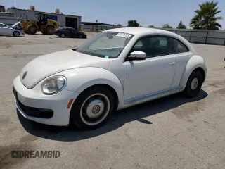 2013 Volkswagen Beetle 2.5L w/Sun with VIN 3VWJP7AT7DM604470, listed as a Copart auction lot 61271265 with 215,210 mi miles and Salvage title. Bid and sale history available at DreamBid. Image 1.