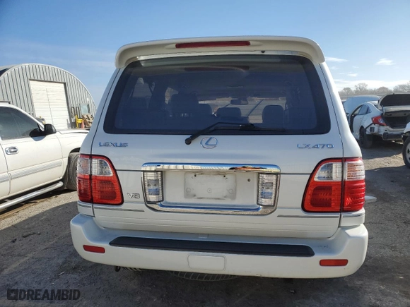2003 Lexus LX 470 with VIN JTJHT00W533525098, listed as a Copart auction lot 82814794 with 0 mi miles and Salvage Title. Bid and sale history available at carsss.com. Image 6.