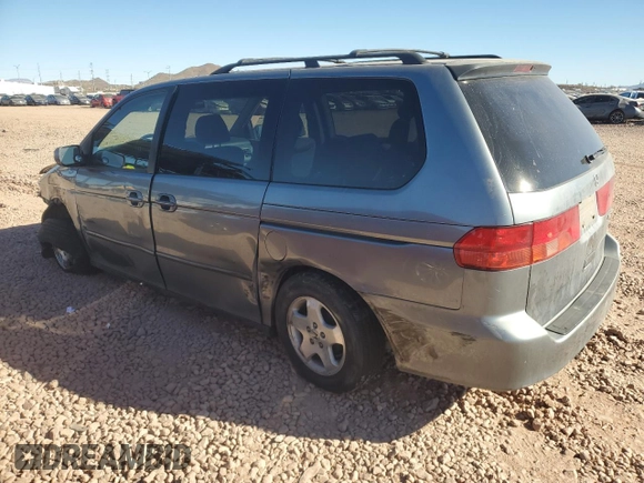 1999 Honda Odyssey EX with VIN 2HKRL1860XH541737, listed as a Copart auction lot 88897965 with 112,164 mi miles and Salvage title. Bid and sale history available at DreamBid. Image 2.