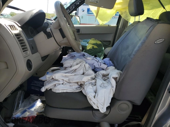 2008 Ford Escape XLS with VIN 1FMCU02Z38KB15233, listed as a Copart auction lot 56180325 with Not provided miles and Salvage title. Bid and sale history available at DreamBid. Image 7.